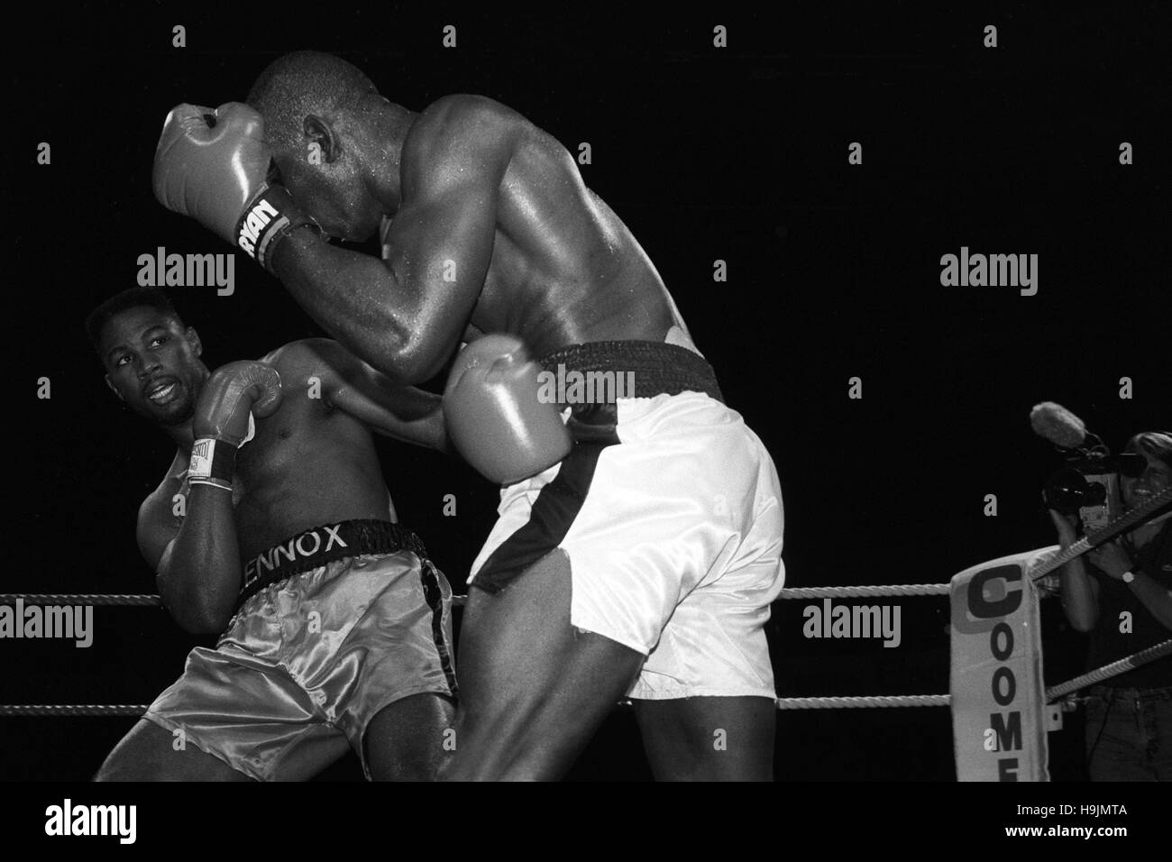 London-born Lennox Lewis (l) anticipates the next move from Birmingham's Al Malcolm during their heavyweight fight at the Royal Albert Hall, London. Stock Photo