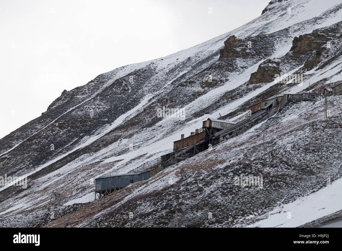 Dilapidated buildings of abandoned former coal mine at Longyearbyen, Svalbard / Spitsbergen Stock Photo