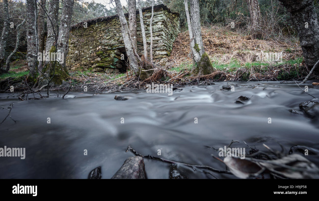 Silk water and vintage waterwheel Stock Photo Alamy