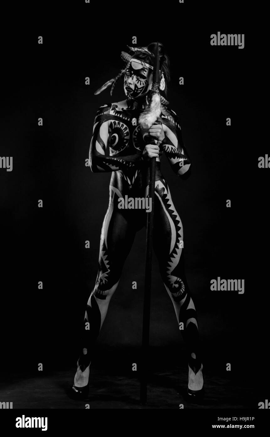 Girl Painted With Black Paint In The Image Of Warrior Women On A Stock Photo Alamy