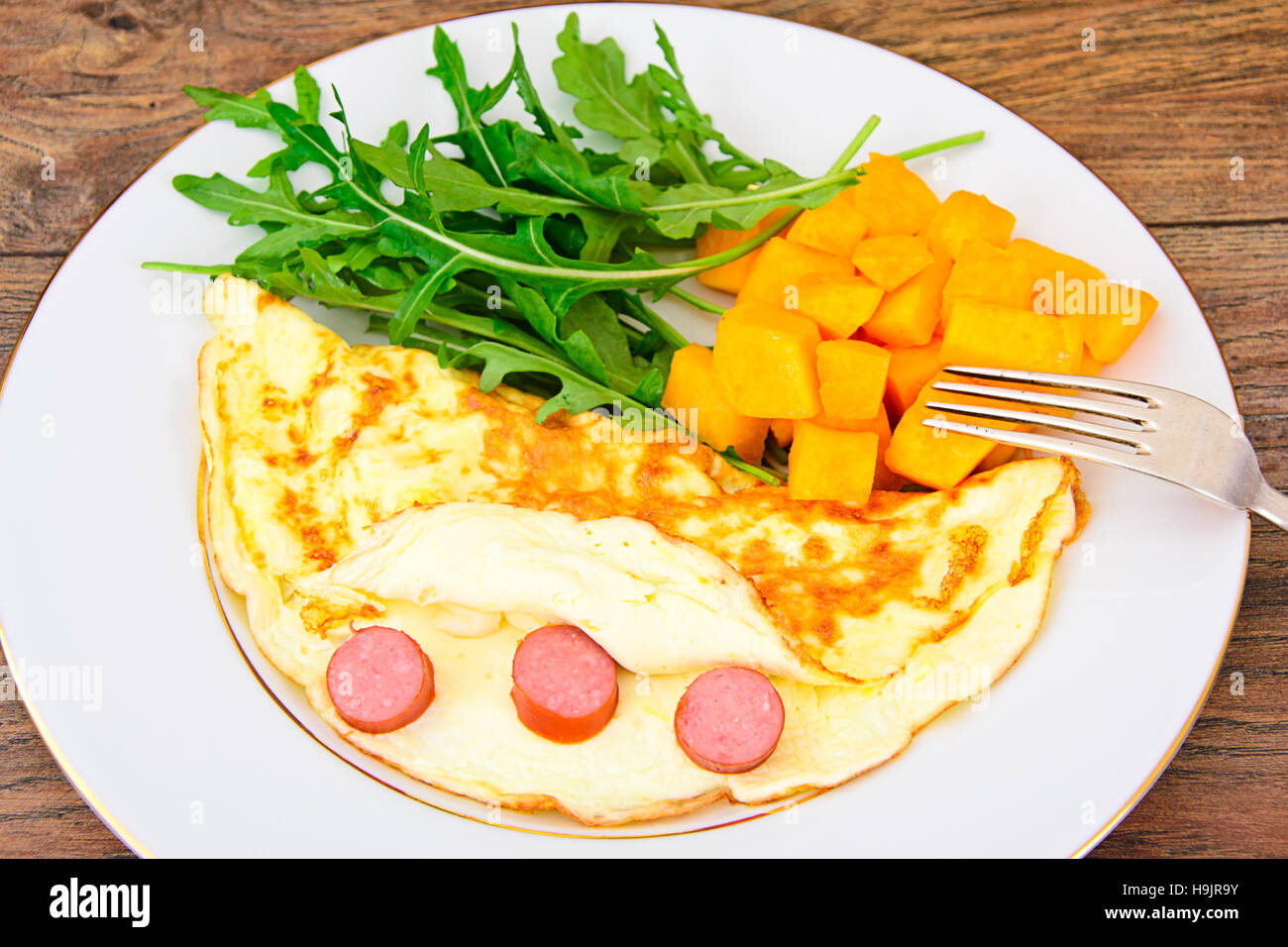 Healthy and Diet Food Scrambled Eggs with Vegetables. Studio Photo