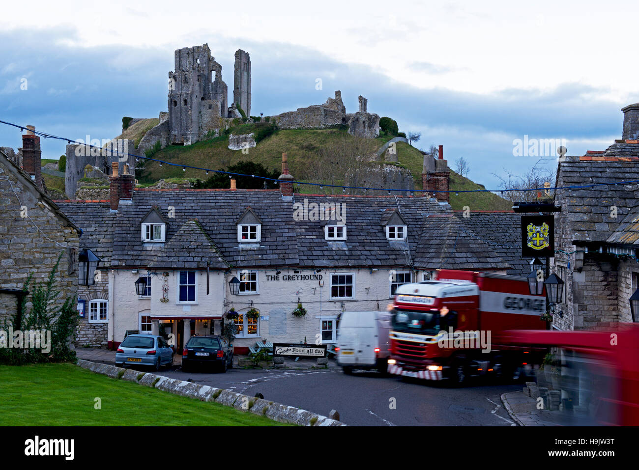 Corfe Castle and the Greyhound Inn, Isle of Purbeck, Dorset, England UK Stock Photo