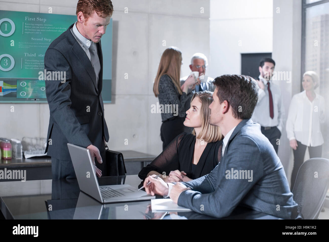 Business people in office meeting Stock Photo - Alamy