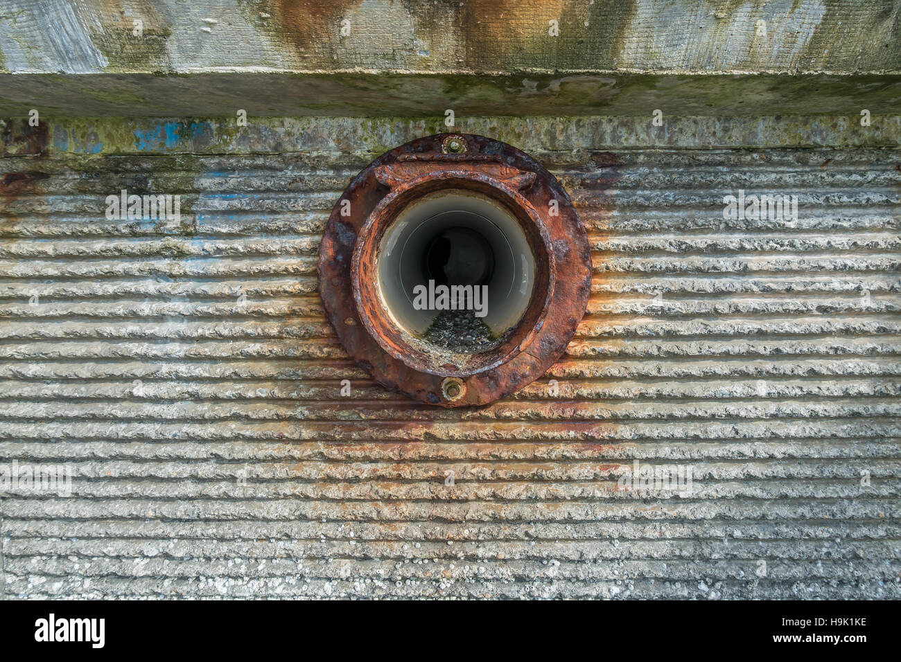 A view of a sewer outlet in a wall at Redondo Beach, Washington. Stock Photo