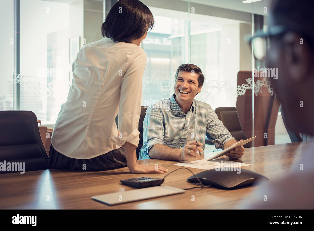 Business people in meeting having interesting discussion Stock Photo