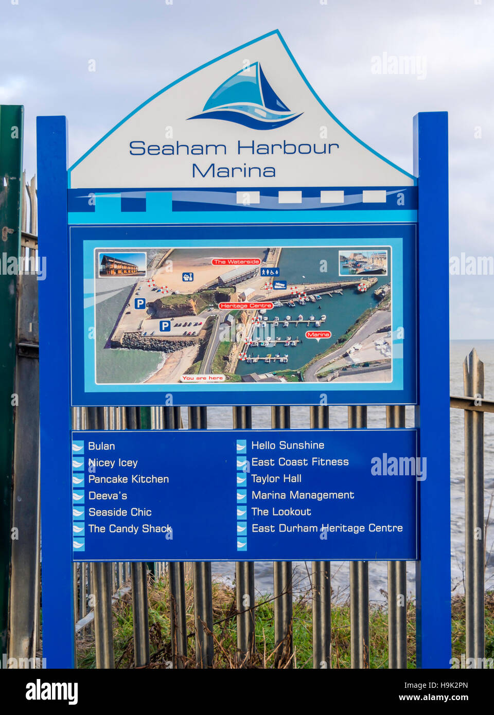 Sign at the road entrance to Seaham Harbour Marina showing visitor attractions including the  East Durham Heritage Centre Stock Photo