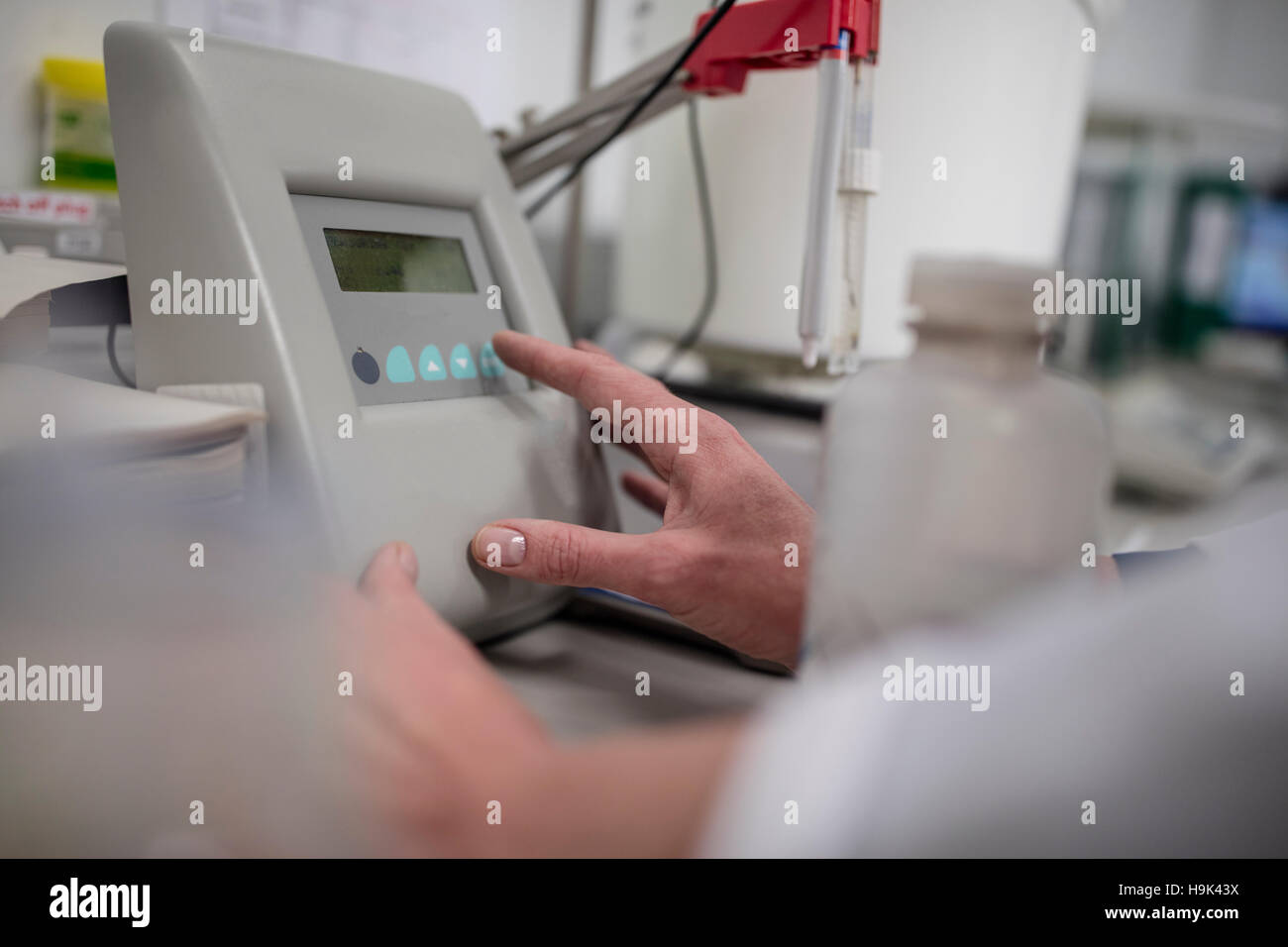 Close-up of hand and equipment in lab Stock Photo - Alamy
