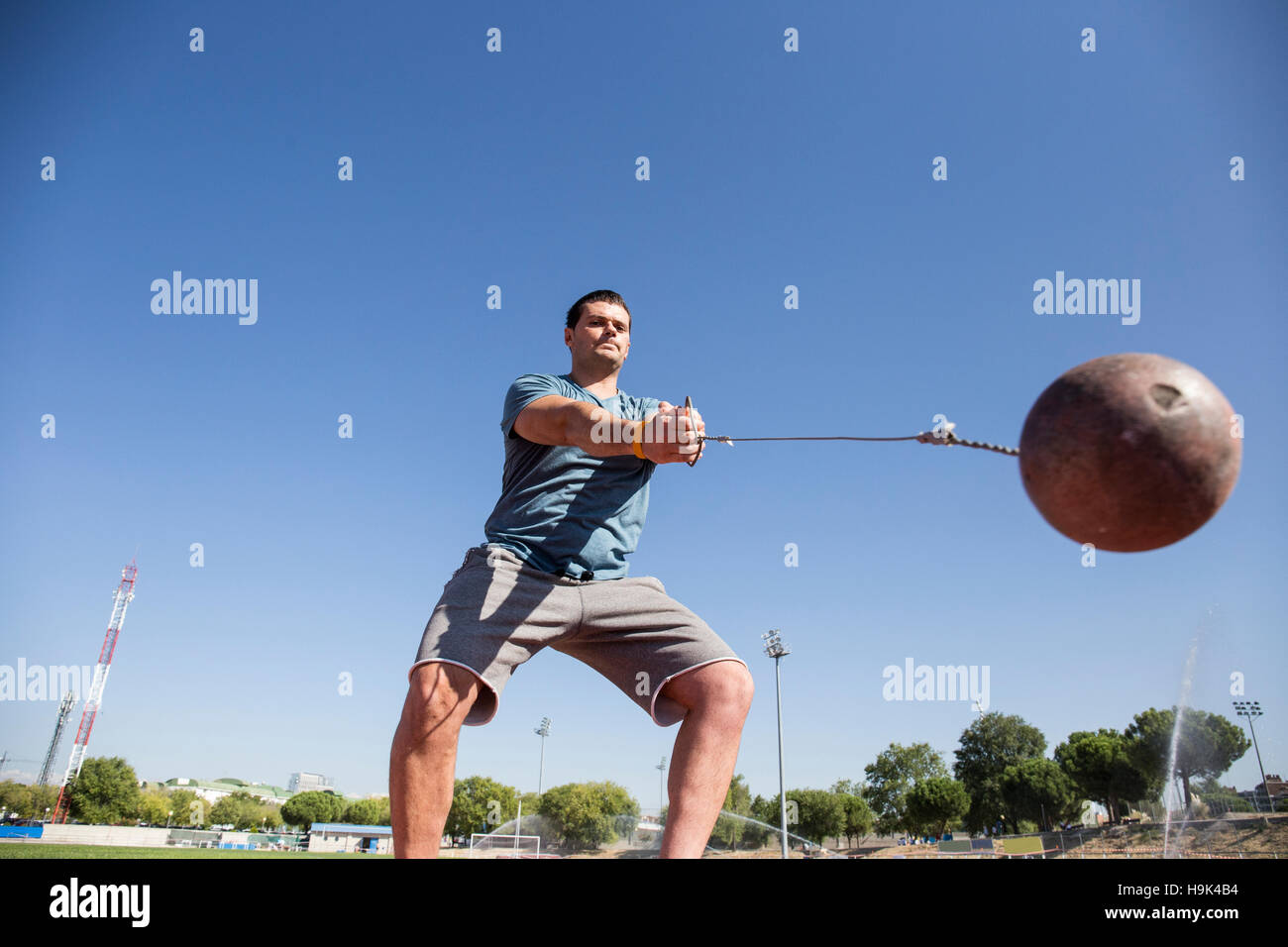Athlete performing a hammer throw Stock Photo Alamy