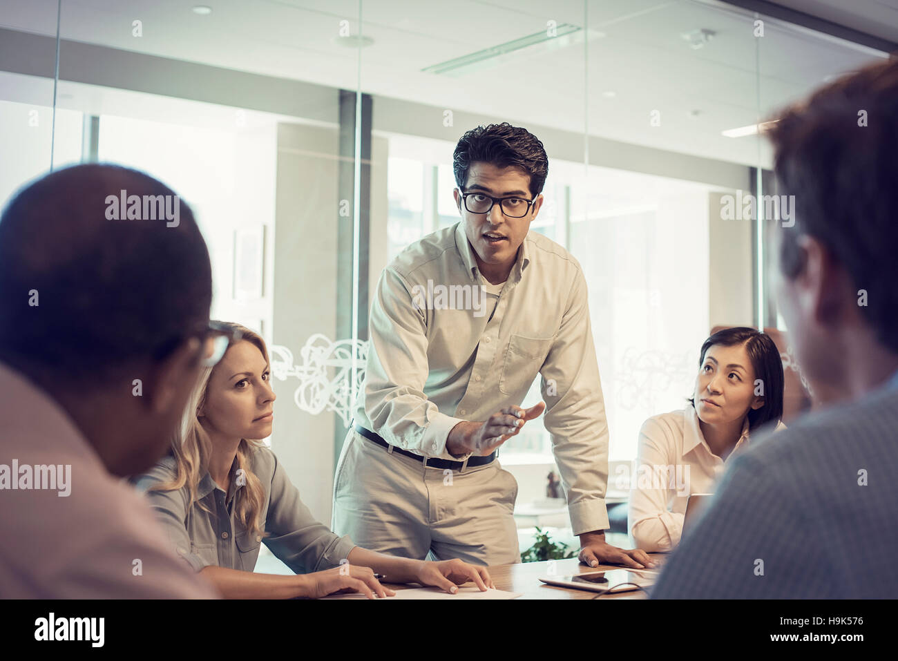 Business people in meeting having interesting discussion Stock Photo