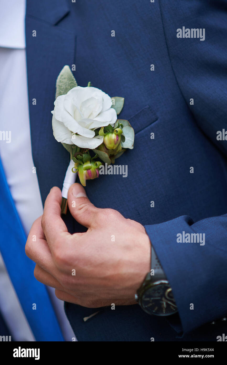 groom dress boutonniere on a jacket Stock Photo