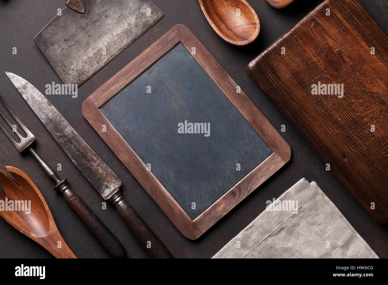 Old Vintage Kitchen Utensils On Stone Table Top View With