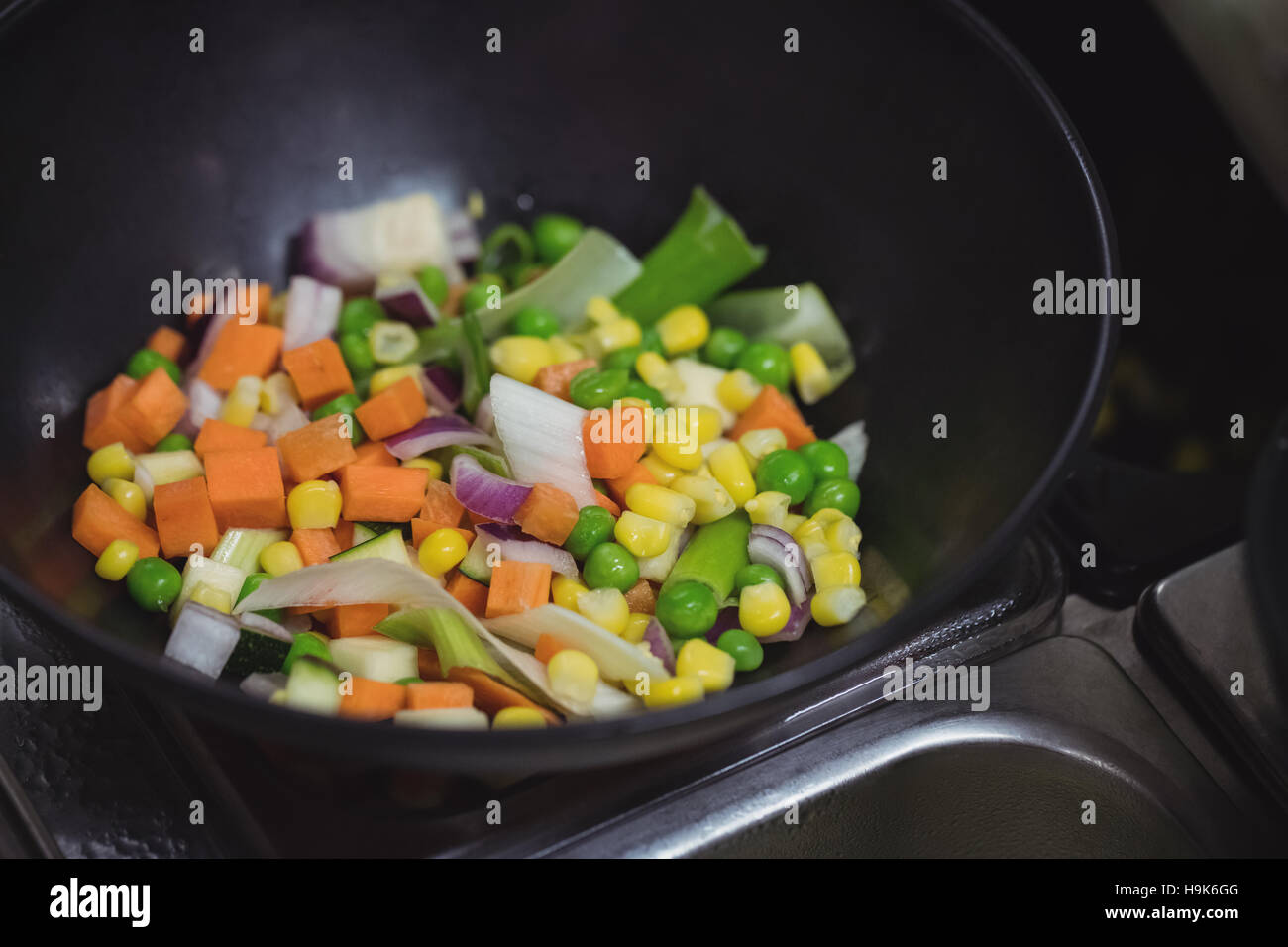 Chopped vegetables in pot Stock Photo