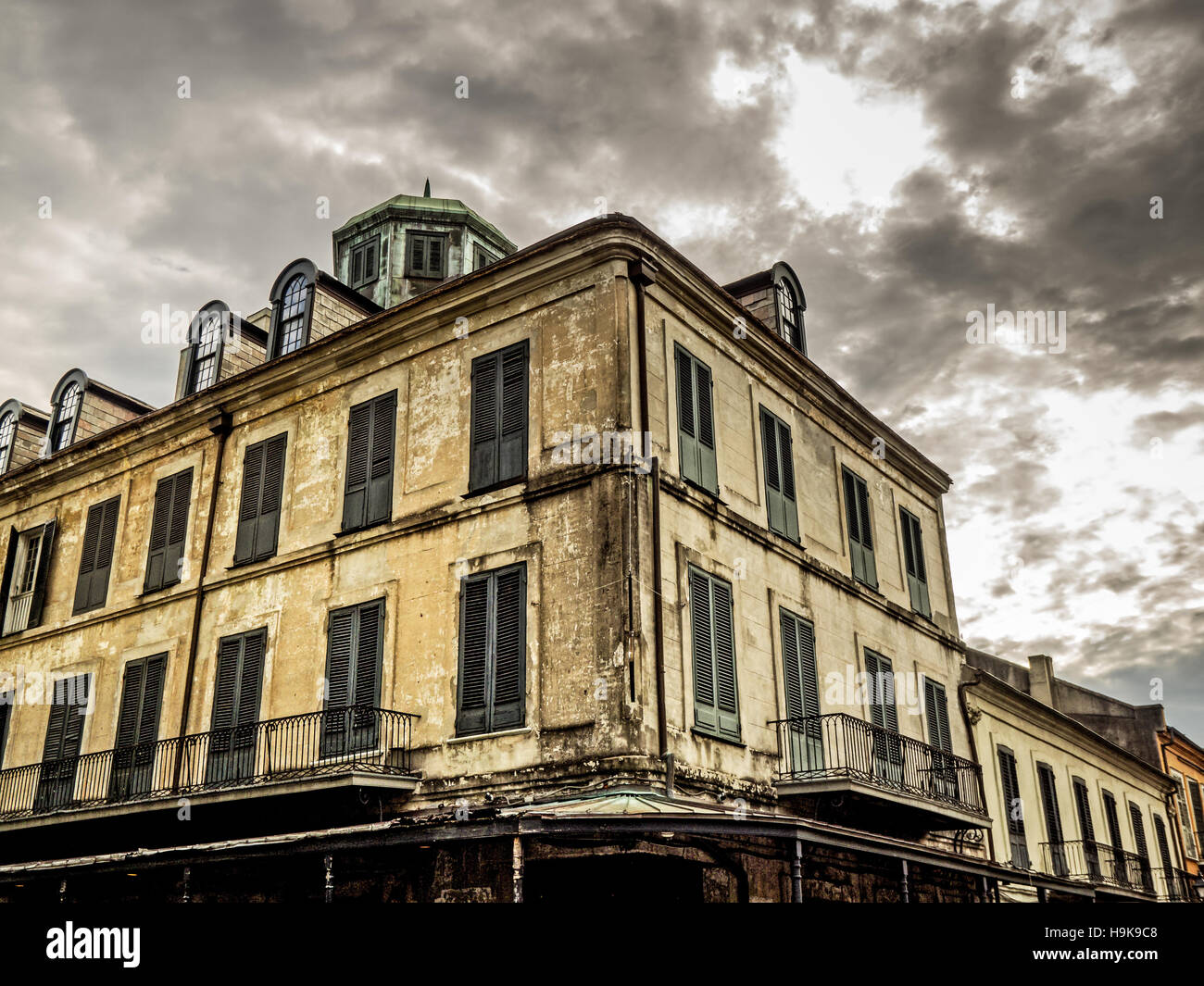 Old Building with Balcony in the French Quarter Stock Photo - Alamy