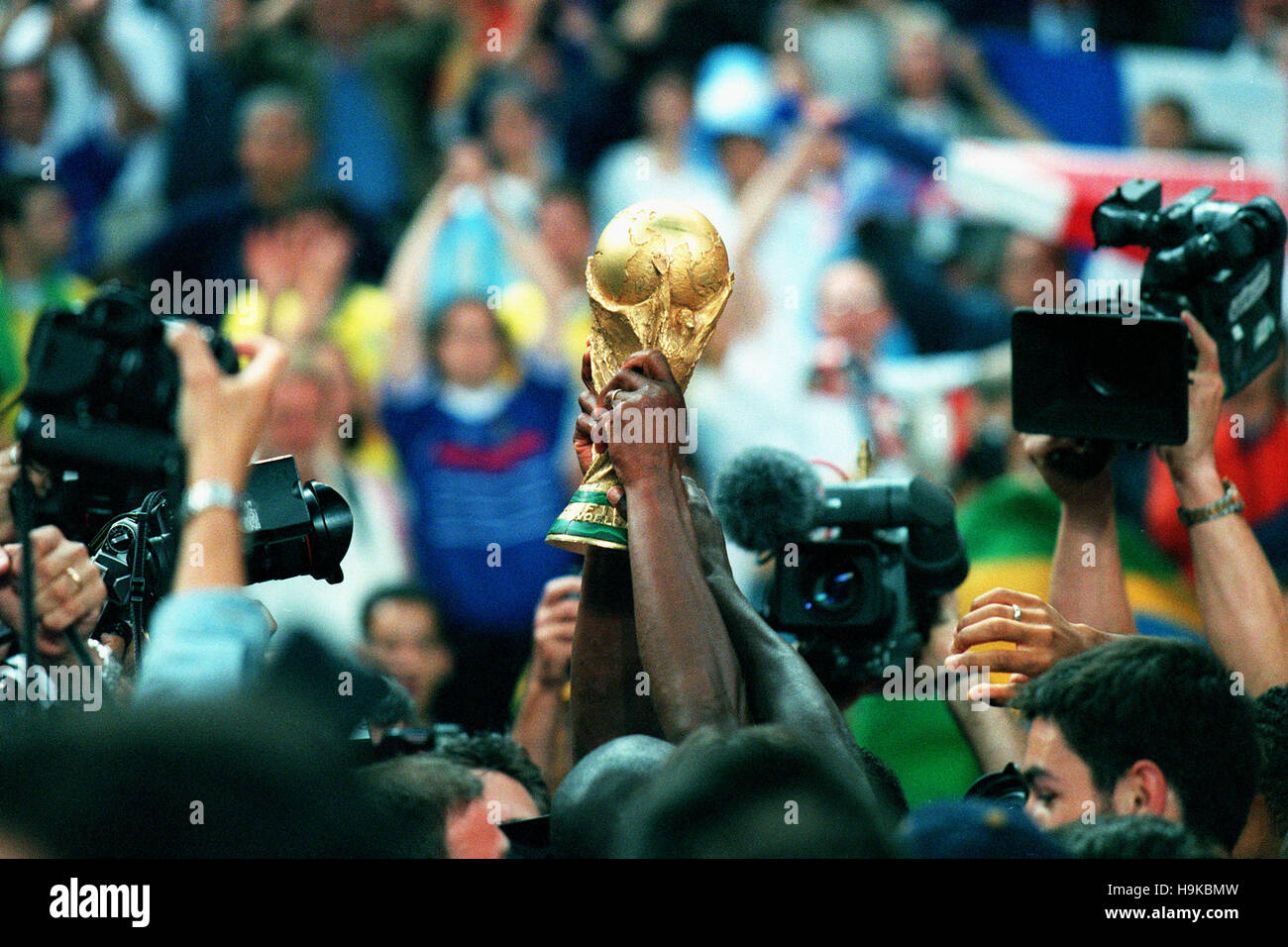 WORLD CUP TROPHY IS HELD ALOFT BRAZIL V FRANCE 12 July 1998 Stock Photo