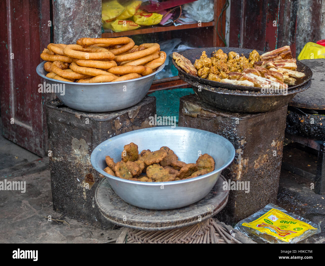 3 bowls of fried street food in Nepal Stock Photo