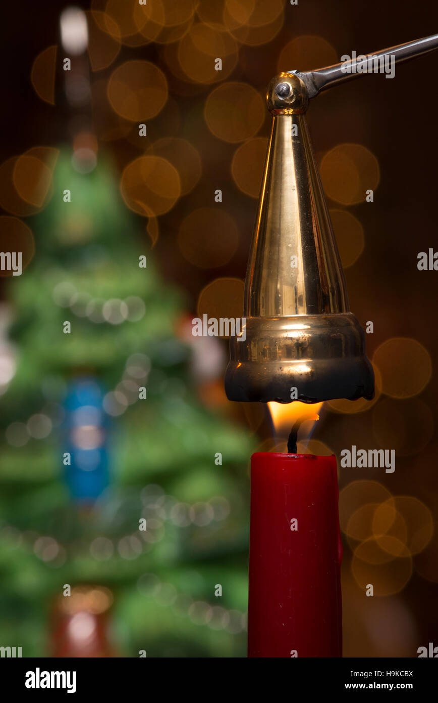 snuffing out candle day after christmas Stock Photo Alamy