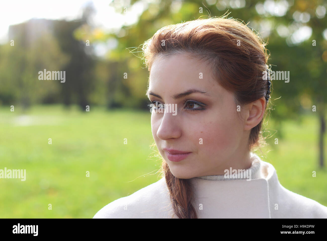 girl walking in the park in autumn Stock Photo Alamy