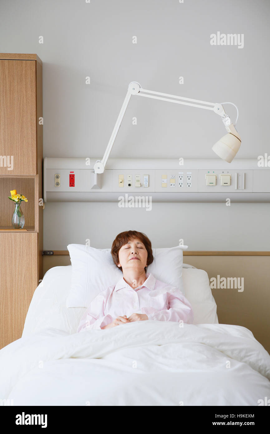 Hospitalized senior Japanese woman Stock Photo