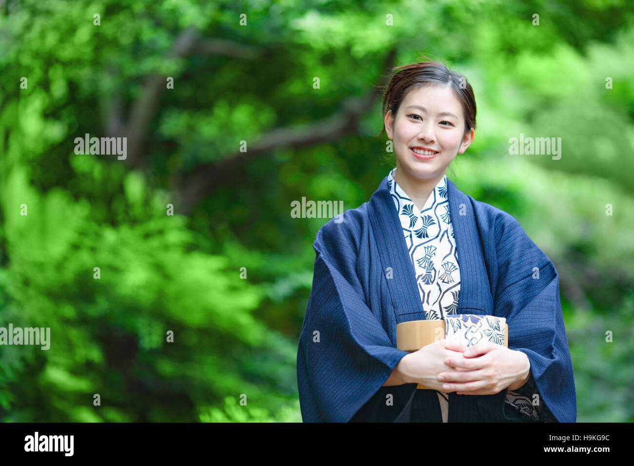 Young Japanese woman wearing yukata at traditional onsen hot spring Stock Photo