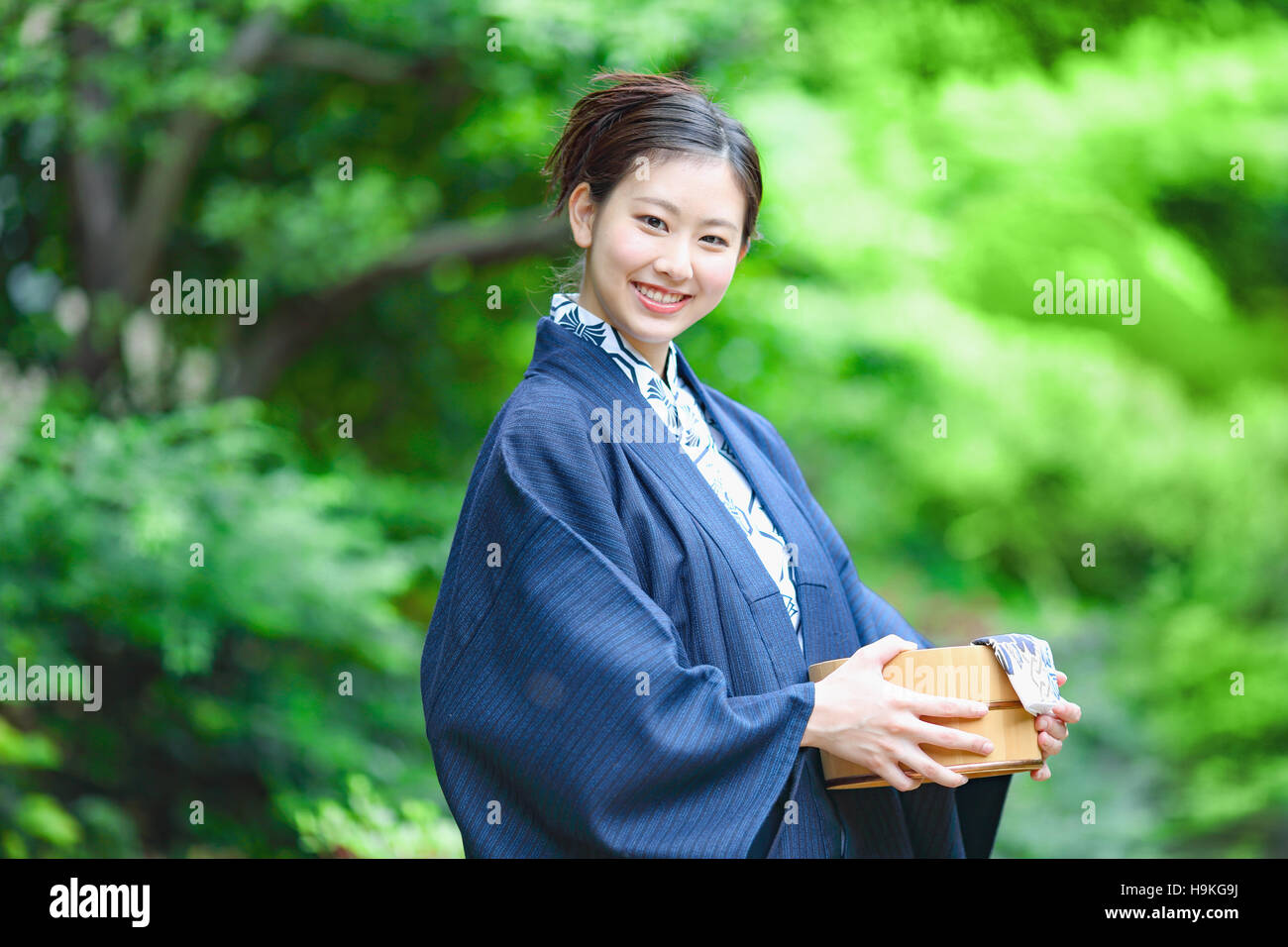 Young Japanese woman wearing yukata at traditional onsen hot spring Stock Photo