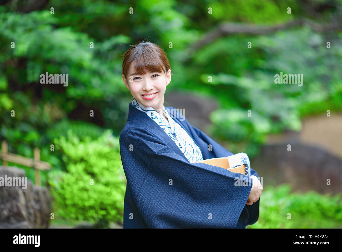 Young Japanese woman wearing yukata at traditional onsen hot spring Stock Photo