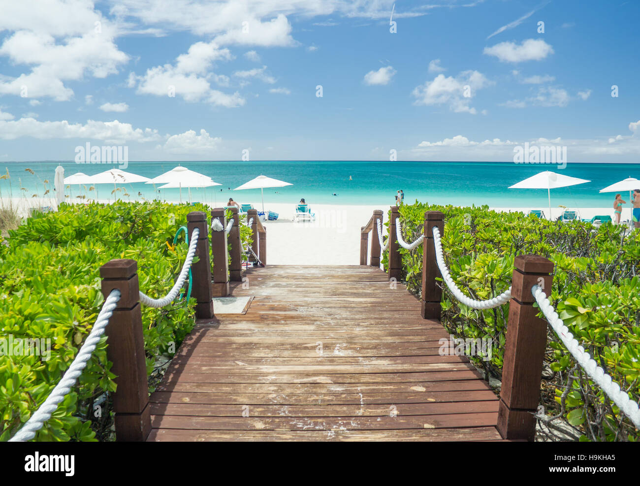 Boardwalk Leading to the White Beach of Grace Bay, Turks and Caicos Islands Stock Photo