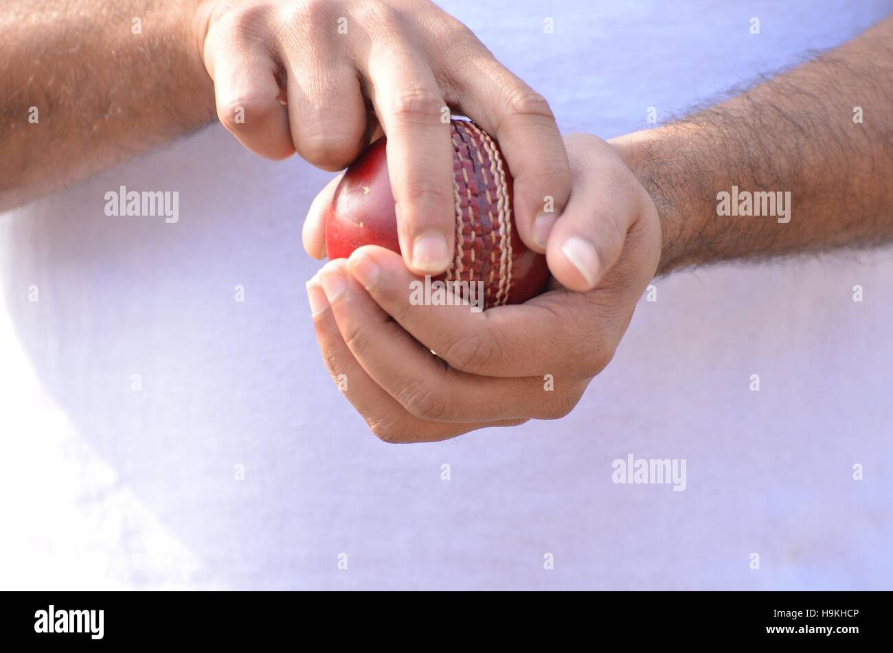 cricket fast bowler going to ball. Stock Photo