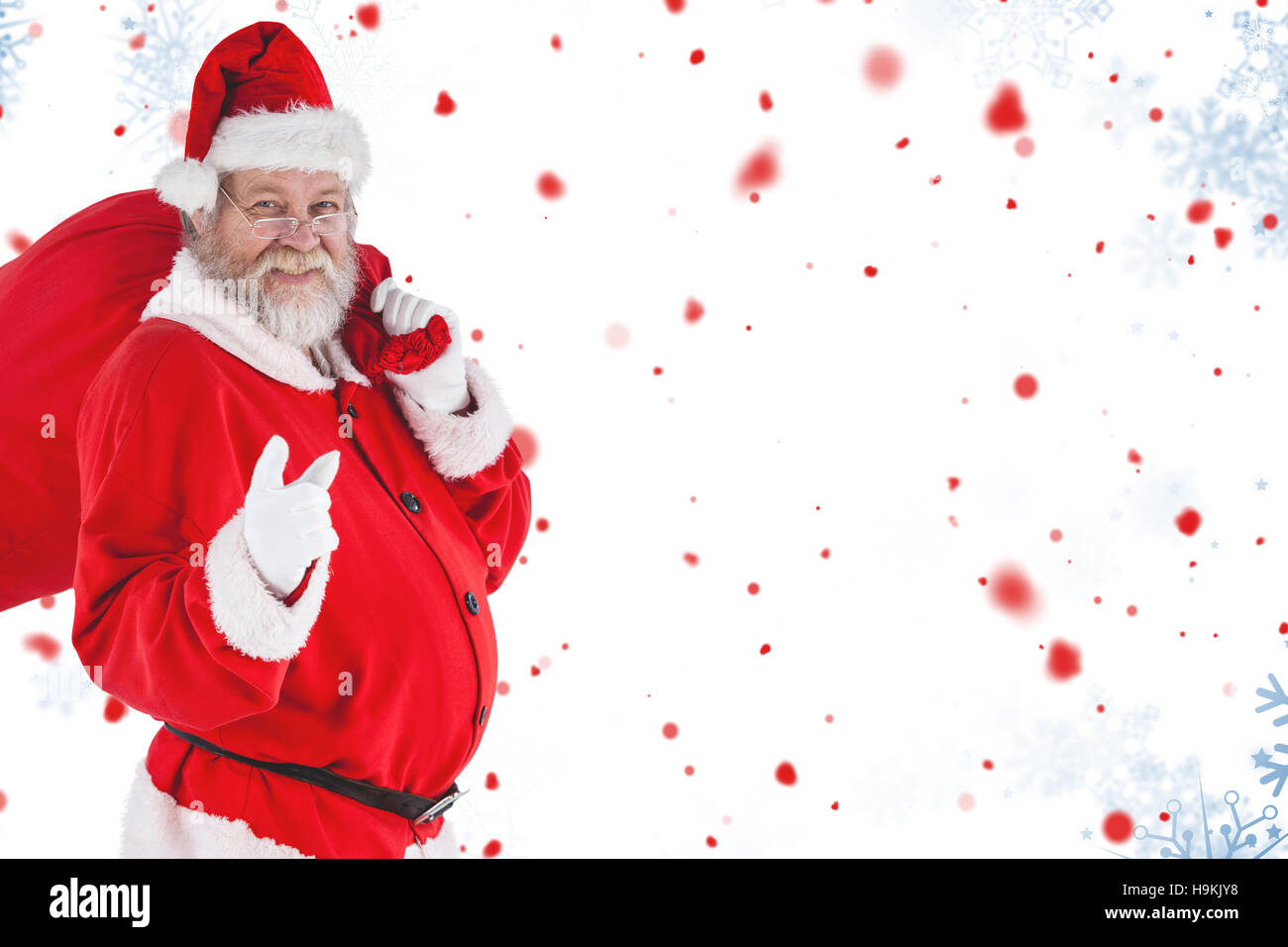 Composite image of portrait of santa claus pointing while carrying ...