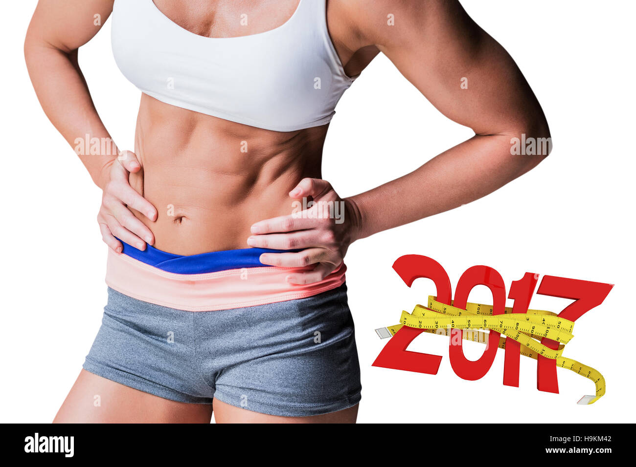 3D Composite image of midsection of muscular female athlete Stock Photo