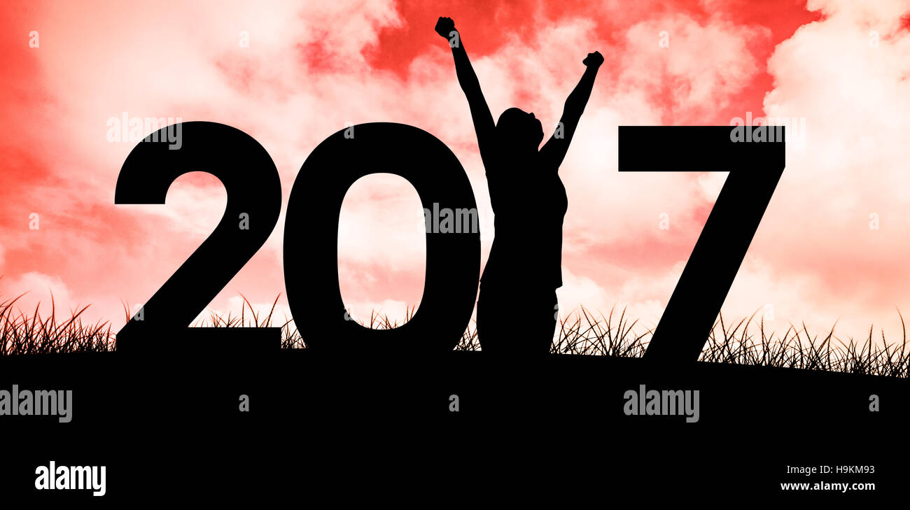 Composite image of cheering female silhouette Stock Photo