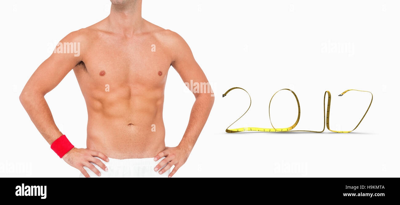 3D Composite image of male athlete standing on white background Stock Photo
