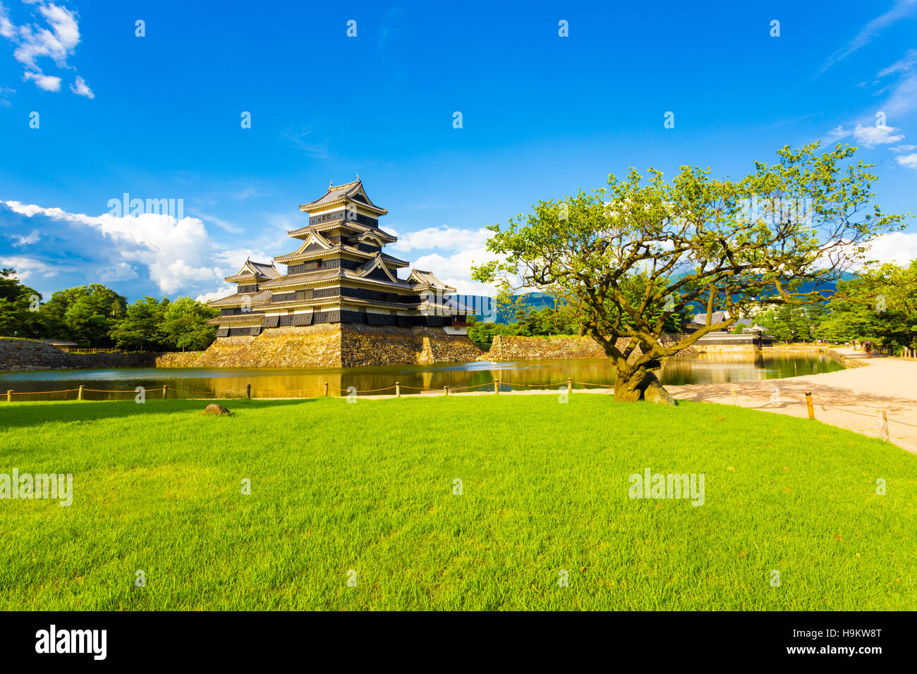 A pleasant grass park surrounds the moat water of Matsumoto Jo Castle