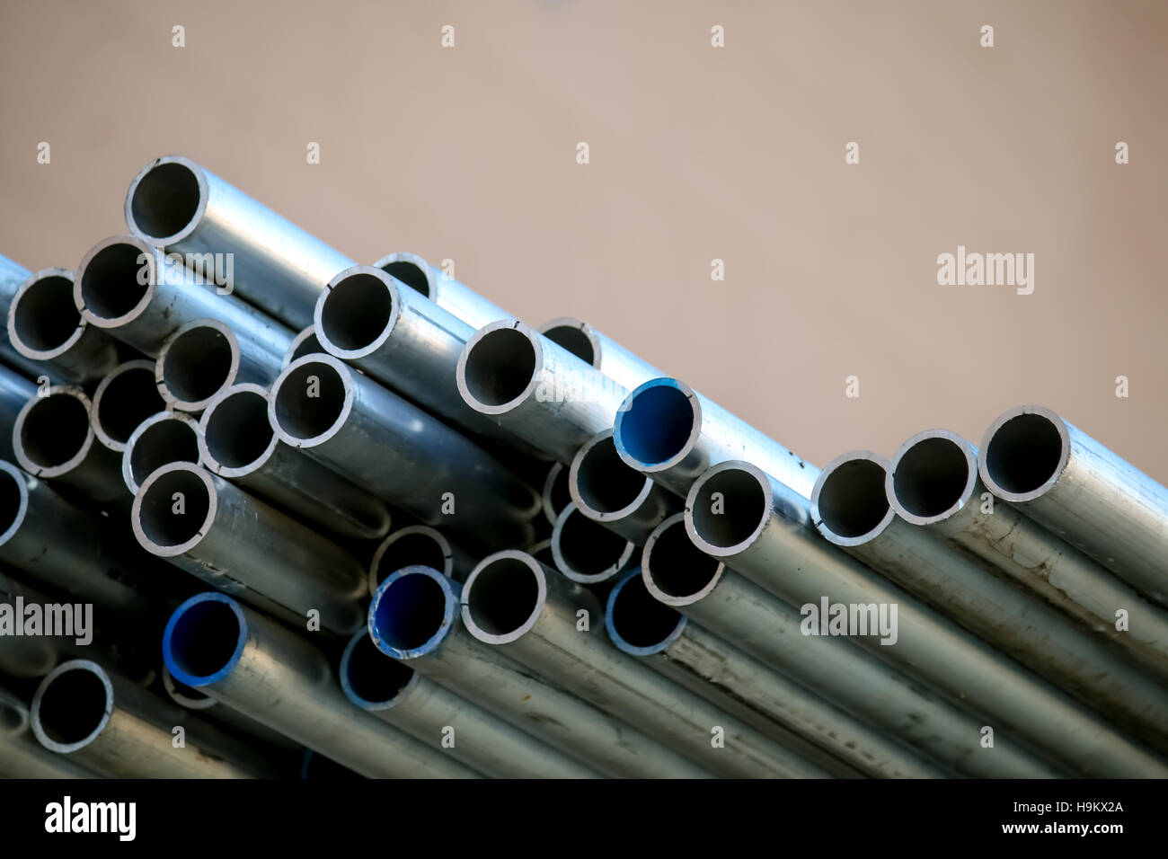 Stack of Many Pipes at the Construction Site Stock Photo - Alamy