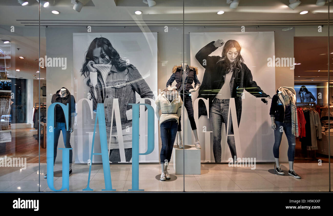 Gap clothing store window display featuring female clothing. Thailand S. E.  Asia Stock Photo - Alamy