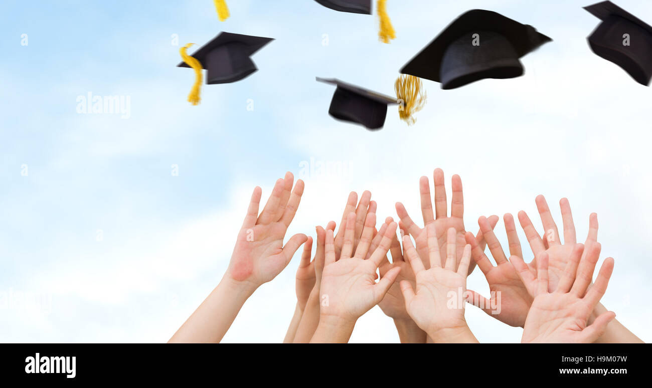 Composite image of people raising hands in the air Stock Photo - Alamy