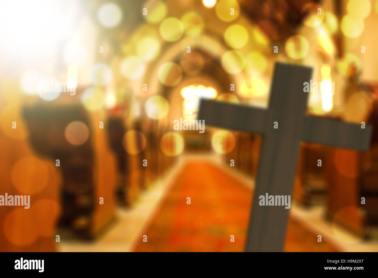 3D rendering of wooden cross in blurred church interior with bokehs Stock Photo