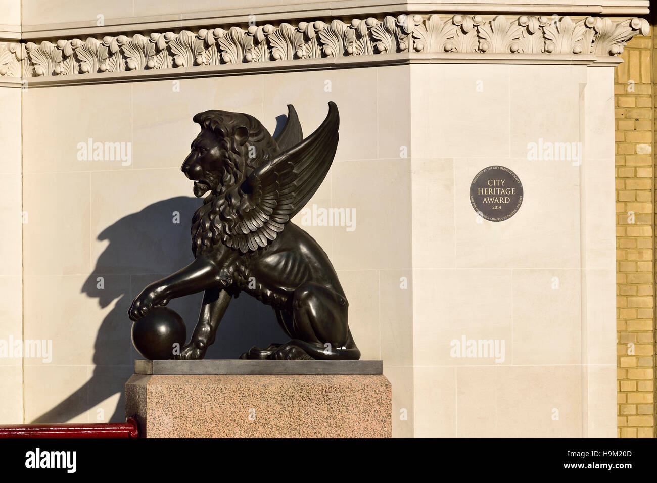 London, England, UK. Holborn Viaduct - bronze winged lion sculpture (Henry Bursill)  and City Heritage Award plaque Stock Photo
