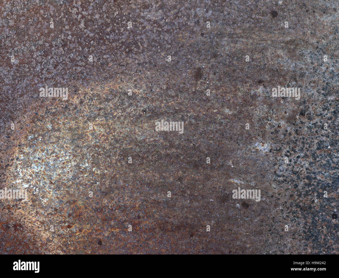 Rusty and worn surface of the iron plate Stock Photo