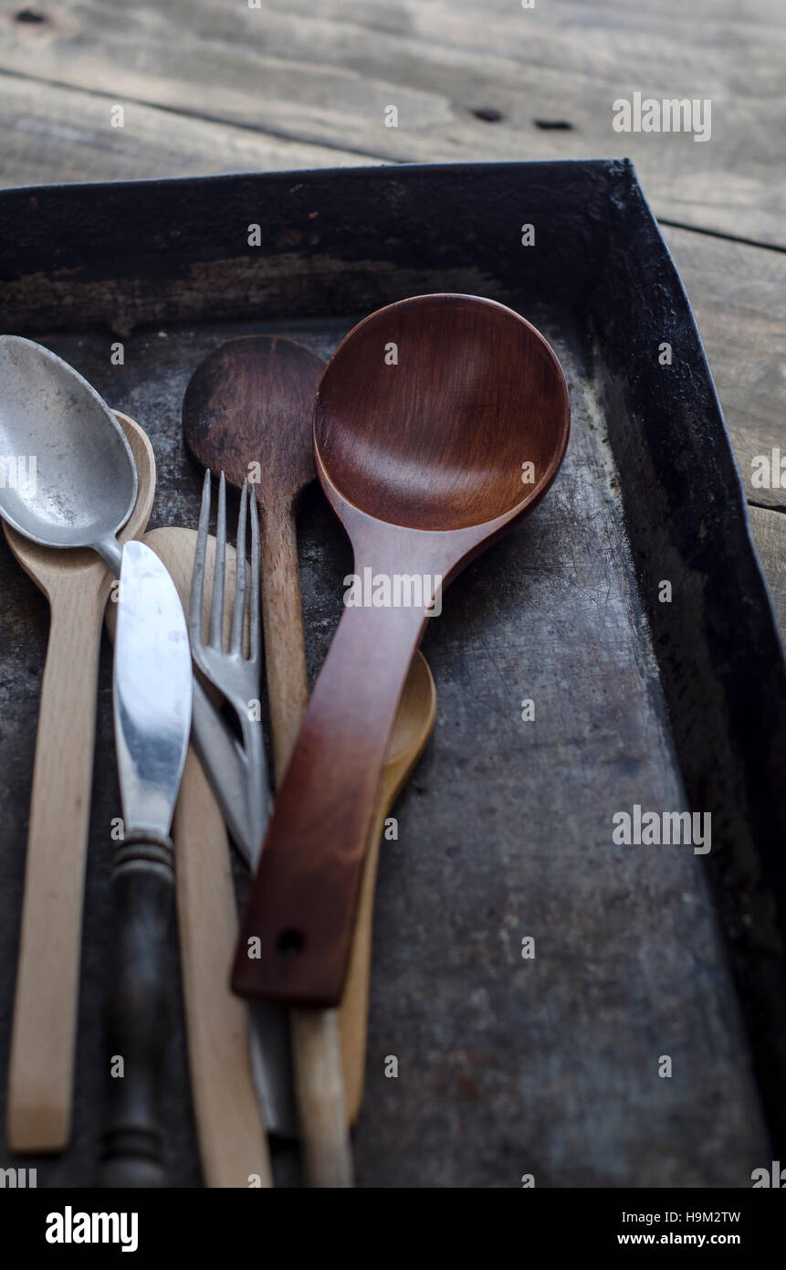 Vintage cutlery props in dark background, from above Stock Photo