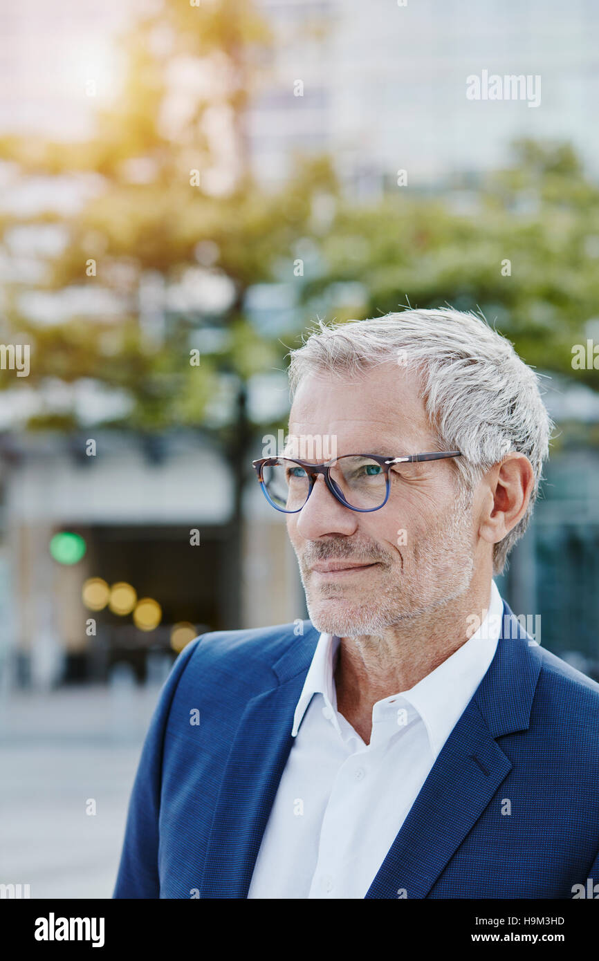 Confident businessman outdoors Stock Photo - Alamy