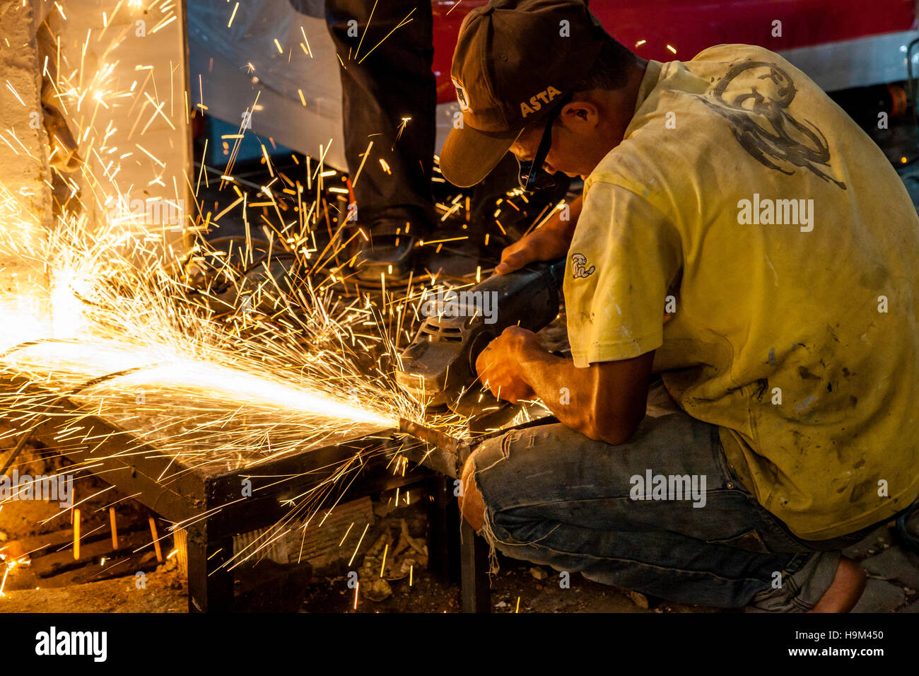 A Metalworker Working In The Street In The Medina, Fez el Bali, Fez, Morocco Stock Photo