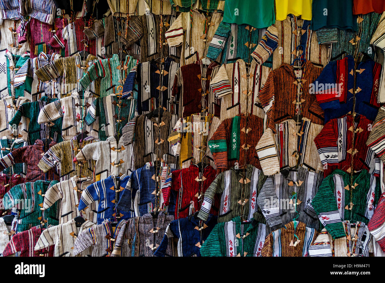 Hanging up coats hi-res stock photography and images - Alamy