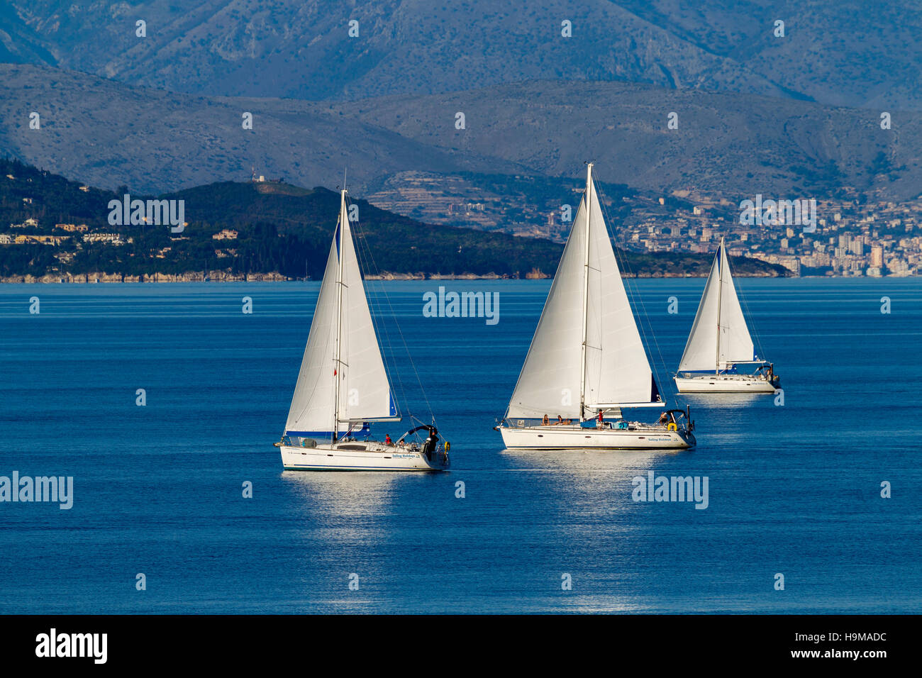Flotilla sailing holiday off Corfu in the Greek islands Stock Photo Alamy
