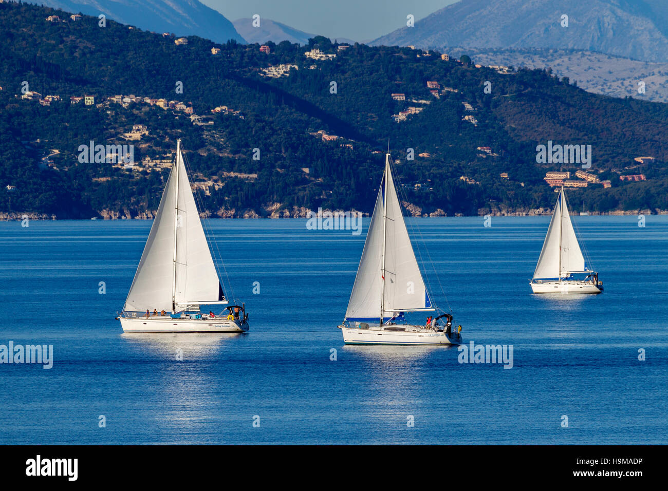 Flotilla sailing holiday off Corfu in the Greek islands Stock Photo Alamy