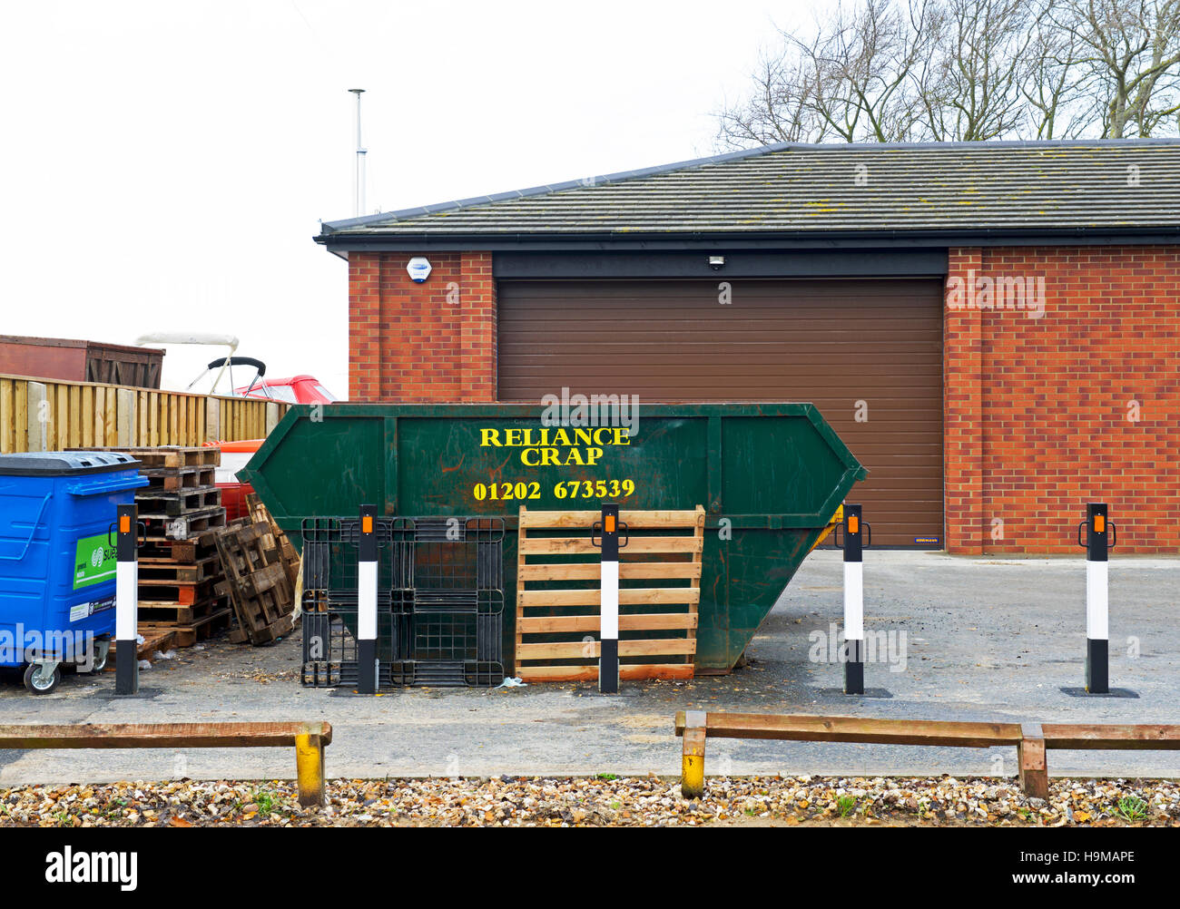 Rubbish Skip from a company called Reliance Crap, England UK Stock Photo