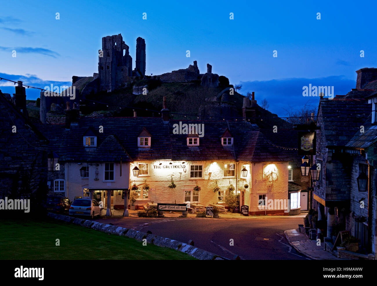 Corfe Castle and the Greyhound Inn, Isle of Purbeck, Dorset, England UK Stock Photo