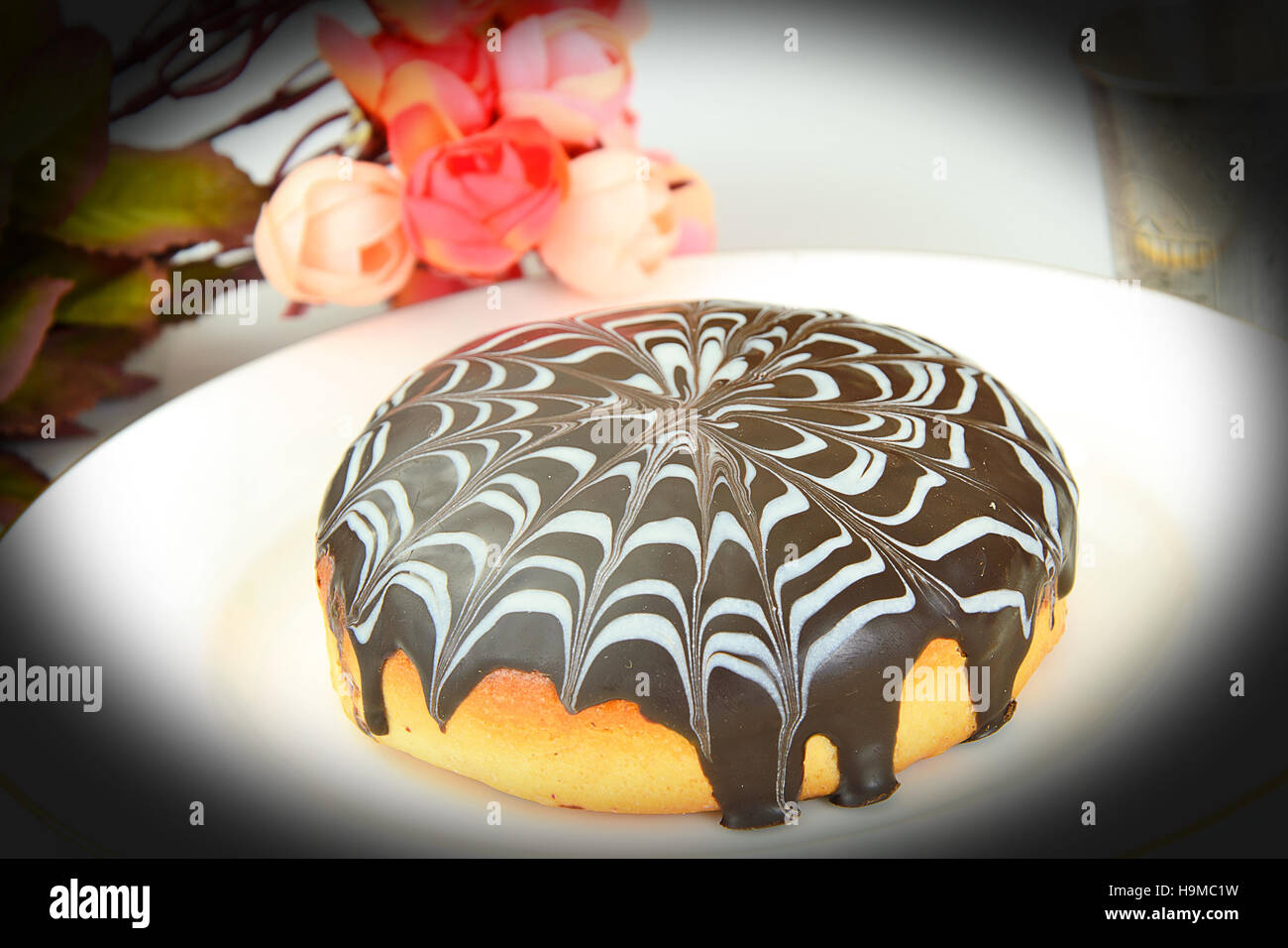 Cake with chocolate on a plate. Studio Photo Stock Photo - Alamy