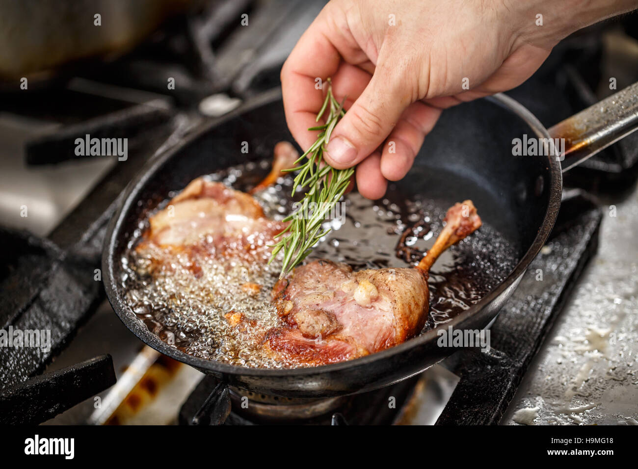 Duck leg roasted Stock Photo - Alamy