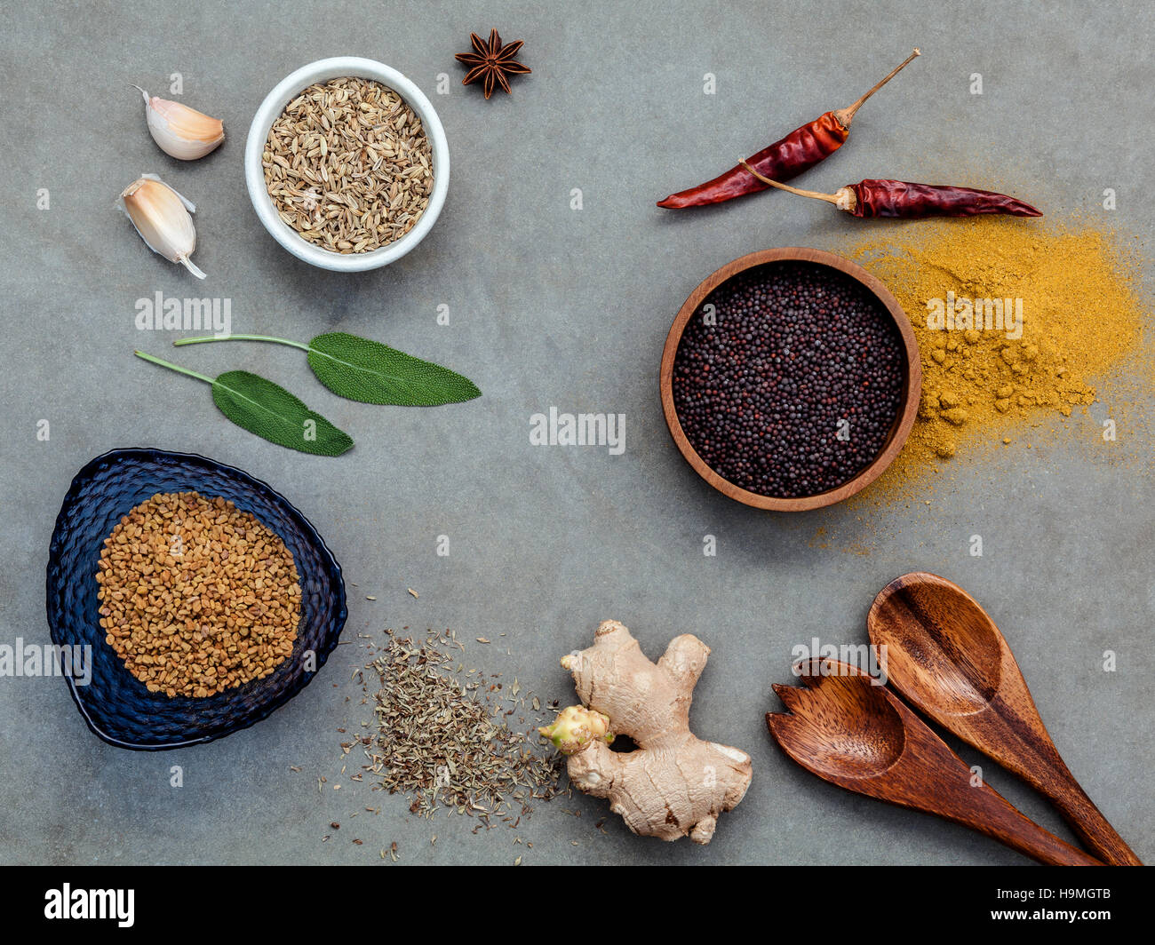 Assorted of spices ginger,fennel seed,dried thyme ,sage leaves,g Stock Photo