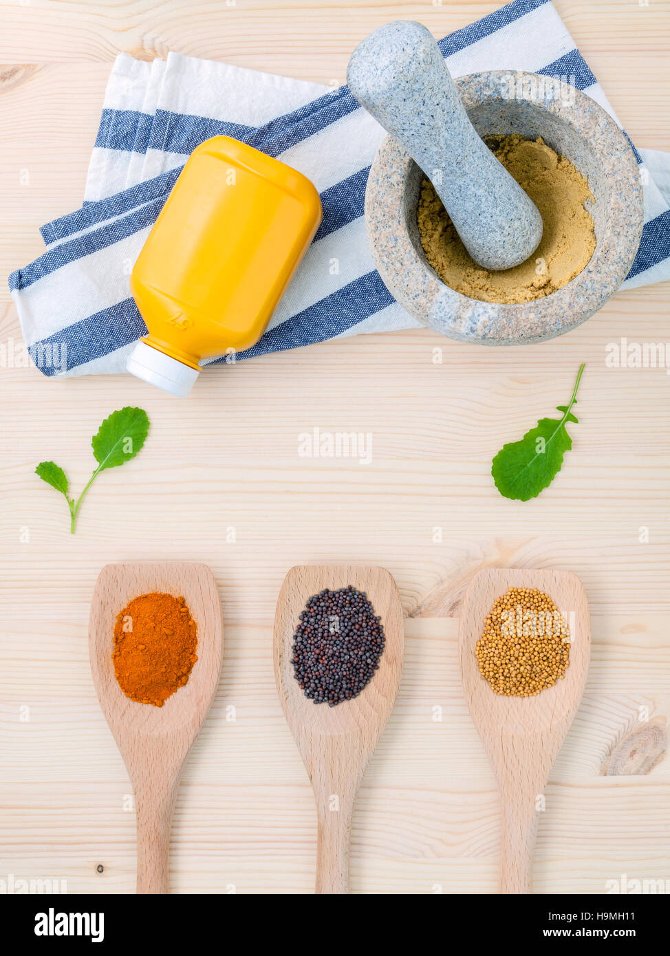 Dried mustard seeds black and yellow with turmeric powder in wo Stock